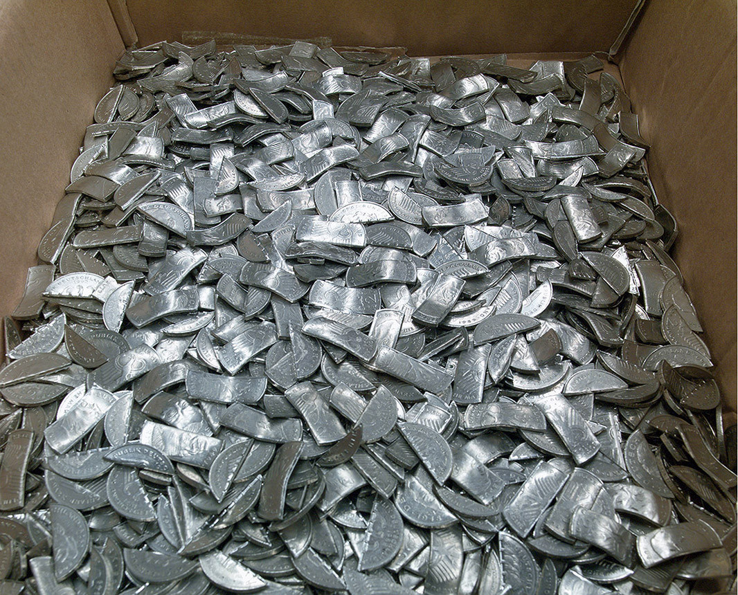 November 2001: Destruction of national coins at a Deutsche Bundesbank branch near Frankfurt.